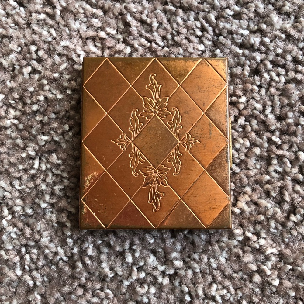 Vintage copper photo compact